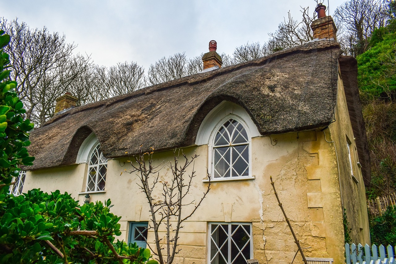 photo of rural cottage with thatched roof